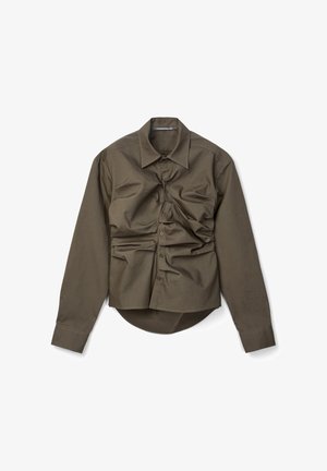 Olive green long-sleeve button-up shirt with ruched detailing across the front and a curved hem.