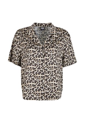 Chemise à manches courtes imprimée léopard avec un col et des boutons noirs, fabriquée en tissu lisse dans une palette de couleurs beige et marron.