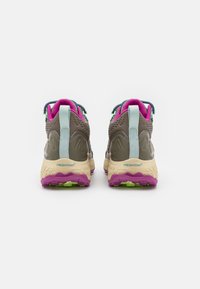 Athletic shoes with a gray upper, lavender accents, and a cushioned cream midsole. Features a textured dark purple outsole and ventilated design.