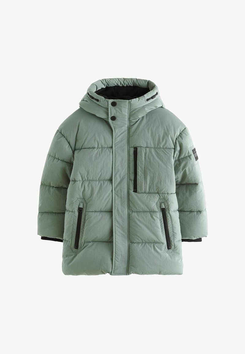 Minti zaļš pūkains mētelis ar kapuci, ar priekšējo rāvējslēdzēju, krūšu kabatu un divām sānu kabatām ar rāvējslēdzēju. Tekstūras izšūšanas dizains.