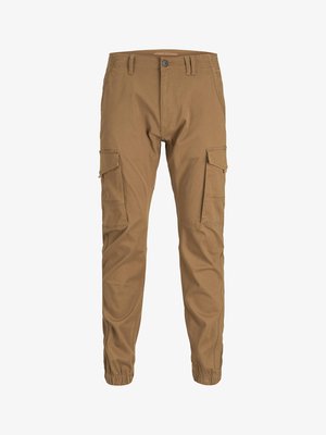 Cargo-Hosen aus braunem Baumwollstoff. Verfügt über zwei Seitentaschen, elastische Bündchen und einen Knopfverschluss. Gerades Beinmodell mit minimalen Nähdetails.