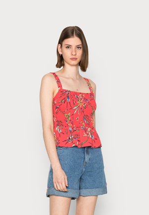 Top floral vermelho com decote quadrado, corpo franzido e alças largas. O tecido apresenta uma estampa tropical colorida e uma bainha peplum.