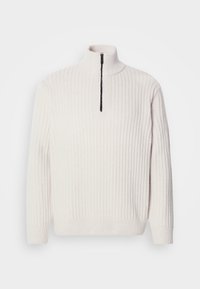 Pull en maille côtelée couleur crème avec manches longues et col noir à fermeture éclair partielle, présenté sur un fond uni.