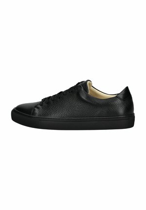 Black leather sneaker with a textured upper, rounded toe, flat sole, and contrasting beige interior; features black laces and minimalistic design.