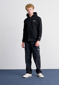 Ellesse MILLEROS - Mikina so zipsom - black
