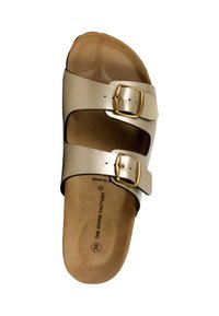 Light gold slide sandal with two adjustable buckle straps. Cork insole with a textured surface. Size 39 marked on the inside.