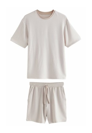 Light beige short-sleeve t-shirt and shorts set with vertical stripes, made of soft fabric, featuring an elastic waistband and side pockets.