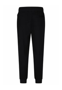 Zwarte sweatpants van zachte stof, met een elastische tailleband, taps toelopende pijpen en een enkele achterzak zonder zichtbare hardware.