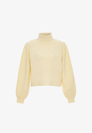 Keltainen neulottu poolopaita, jossa on ribbitetty pinta, lyhyt leikkaus ja pallonmuotoiset hihat, edessä on hienovaraisia rei'itettyjä yksityiskohtia.