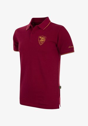 Bordeaux polo shirt gemaakt van katoen met gele accenten. Beschikt over een kraag, korte mouwen en een geborduurd berenlogo op de borst.