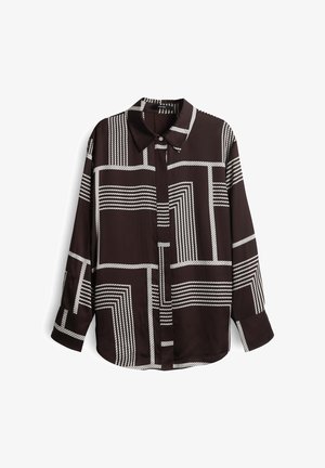 Chemise marron à manches longues avec un motif géométrique de lignes blanches, design avec col et fermeture à boutons. Tissu lisse et léger.