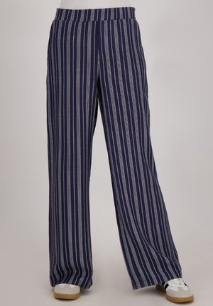 Marineblauw en witte gestreepte wijd uitlopende broek met een elastische tailleband, gemaakt van lichtgewicht stof en in een volle lengte.