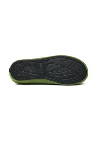 Green felt slipper sole with a textured black rubber base. Features a contoured design and grooves for traction. Natural rubber construction.