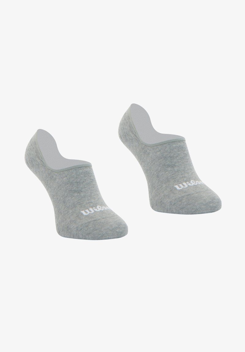 Chaussettes grises, hauteur cheville, avec une texture lisse, présentant un logo blanc discret. Le design est minimaliste et ajusté.