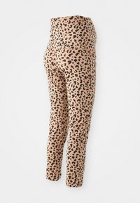 Luipaardprint legging in een lichtbruine kleur, met een hoge tailleband en een soepele, rekbare stof die nauw aansluit.