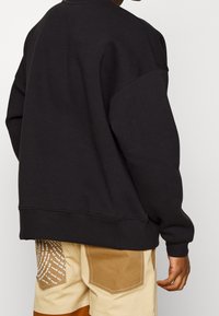 WRSTBHVR Felpa con zip - black
