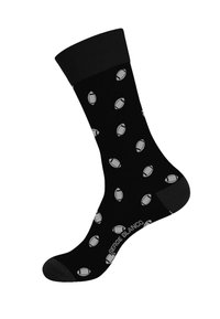 Chaussettes noires ornées d'un motif répétitif de formes ovales grises ressemblant à des ballons de rugby. Le matériau semble lisse avec un revers solide.