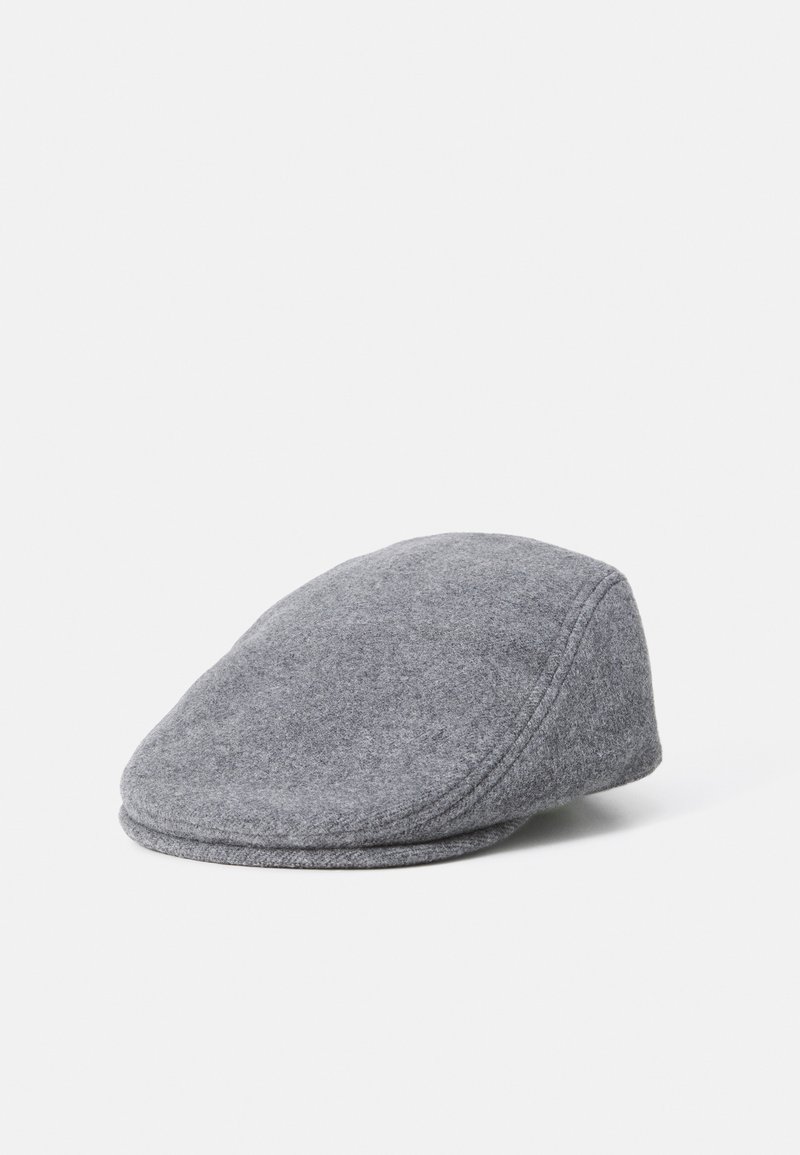 Gray wool flat cap with a rounded shape and subtle seam detailing. Smooth texture, minimalistic design, and no visible hardware accents.