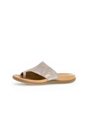Open-toe slide sandal in shimmery light gray suede. Features a split strap design, soft footbed, and tan rubber outsole for comfort.