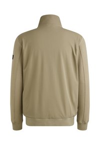 Giacca color beige chiaro con colletto alto, tessuto morbido e polsini a costine. Presenta un design minimalista con dettagli di cucitura.
