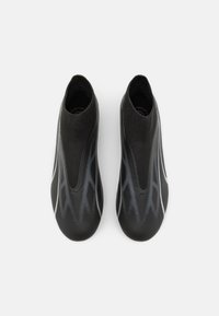 Puma Scarpe da calcio per terreni duri - black