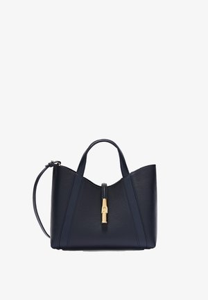 Sac à main en cuir noir avec deux poignées, une longue bandoulière réglable et un fermoir doré central à l'avant.