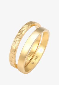 Sélectionné, gold-coloured