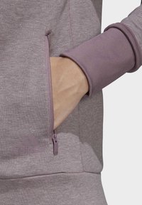 adidas Performance Felpa con zip - purple