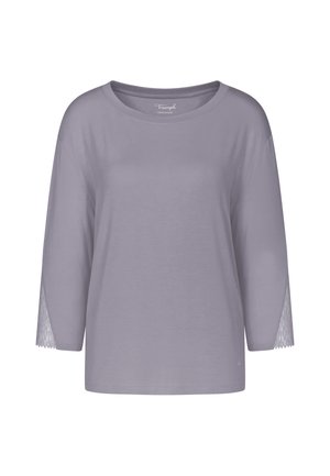 Haut long à manches de couleur lavande clair avec un col rond et des détails en dentelle sur les manches. Tissu doux avec une coupe décontractée. Pas de logos visibles.