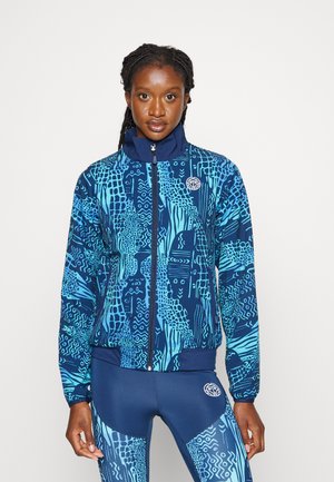 Blue and teal patterned zip-up jacket with high collar and ribbed hem. Features abstract designs and a circular logo on the chest.