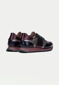 Sneakers featuring metallic purple and blue textured leather with a dark mauve sole. Includes intricate stitching and subtle branding on the back.