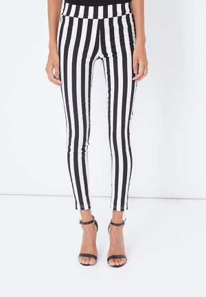 DE RAYAS - Leggings - negros