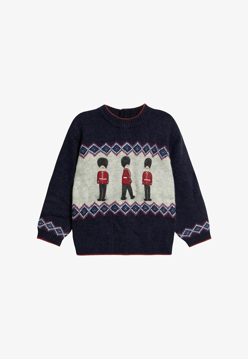 Tumedast sinine kudum, millel on punased, valged ja sinised geomeetrilised mustrid ning rinnaosas kolme punases vormis ja kõrge musta mütsiga kaunistatud kaitsjat.