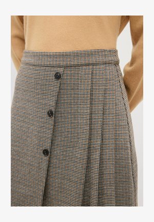 Checkered skirt featuring a mix of brown and black tones, a fitted waistband, and four black buttons down the front for closure.
