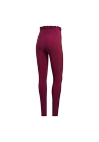 Bordeaux leggings med volangmidja, tillverkade av elastiskt material. Smal passform med en mjuk yta och hel längd.