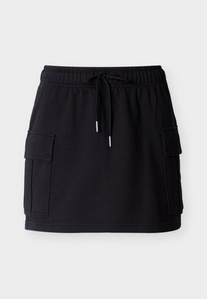 Jupe noire à cordon de serrage en coton doux, dotée de deux poches cargo lat érales et d'une ceinture côtelée. Design à la fois décontracté et fonctionnel.