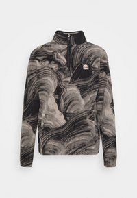 Kwart-rits fleece pullover met een zwart en grijs marmerpatroon, voorzien van een logopatch op de borst. Zachte, gestructureerde stof.
