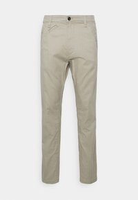 Chinos beige con un corte recto, fabricados en una mezcla de algodón, cuentan con bolsillos laterales y un bolsillo trasero sencillo, terminados con un cierre de botón.