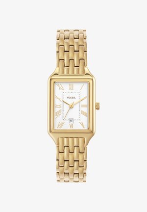 Orologio rettangolare dorato con bracciale metallico, quadrante bianco, numeri romani e display della data alle sei. Nome del marchio "FOSSIL" visibile.