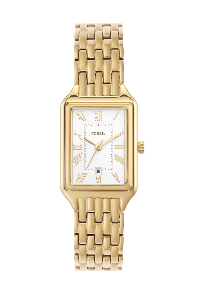 Montre rectangulaire dorée avec bracelet en métal, cadran blanc, chiffres romains et affichage de la date à six heures. Nom de la marque "FOSSIL" visible.