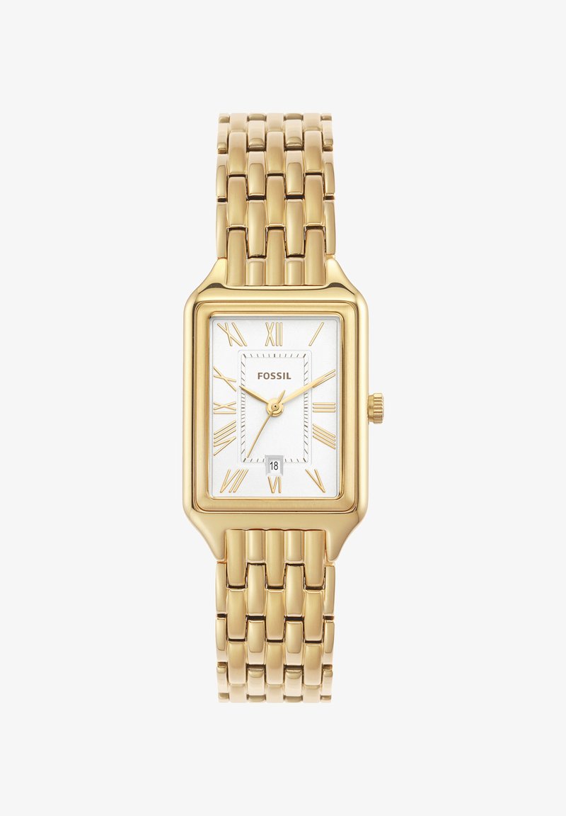 Gold-tone rectangular watch with metal bracelet, white dial, Roman numerals, and date display at six o'clock. Brand name "FOSSIL" visible.