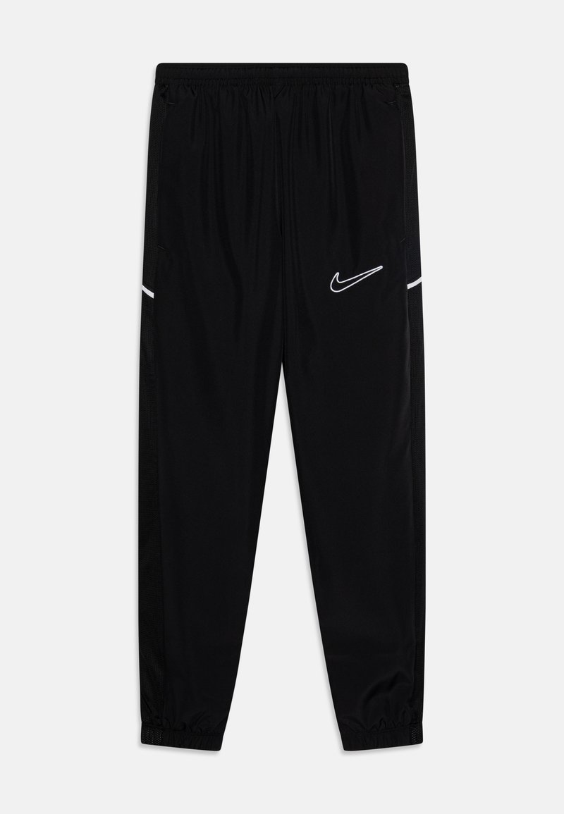 Black athletic pants with elastic waistband, tapered legs, side pockets, and white Nike swoosh logo; made of smooth, lightweight fabric.