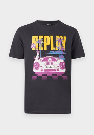 Black T-shirt with yellow "REPLAY" text above a pink and white race car numbered 81, palm trees, and checkered flag pattern.
