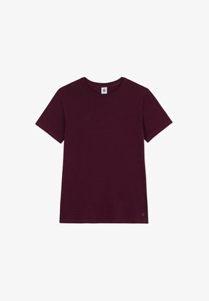 T-shirt violet foncé uni à manches courtes et col rond, posé à plat, montrant le devant et l'étiquette de la marque à l'intérieur du col.
