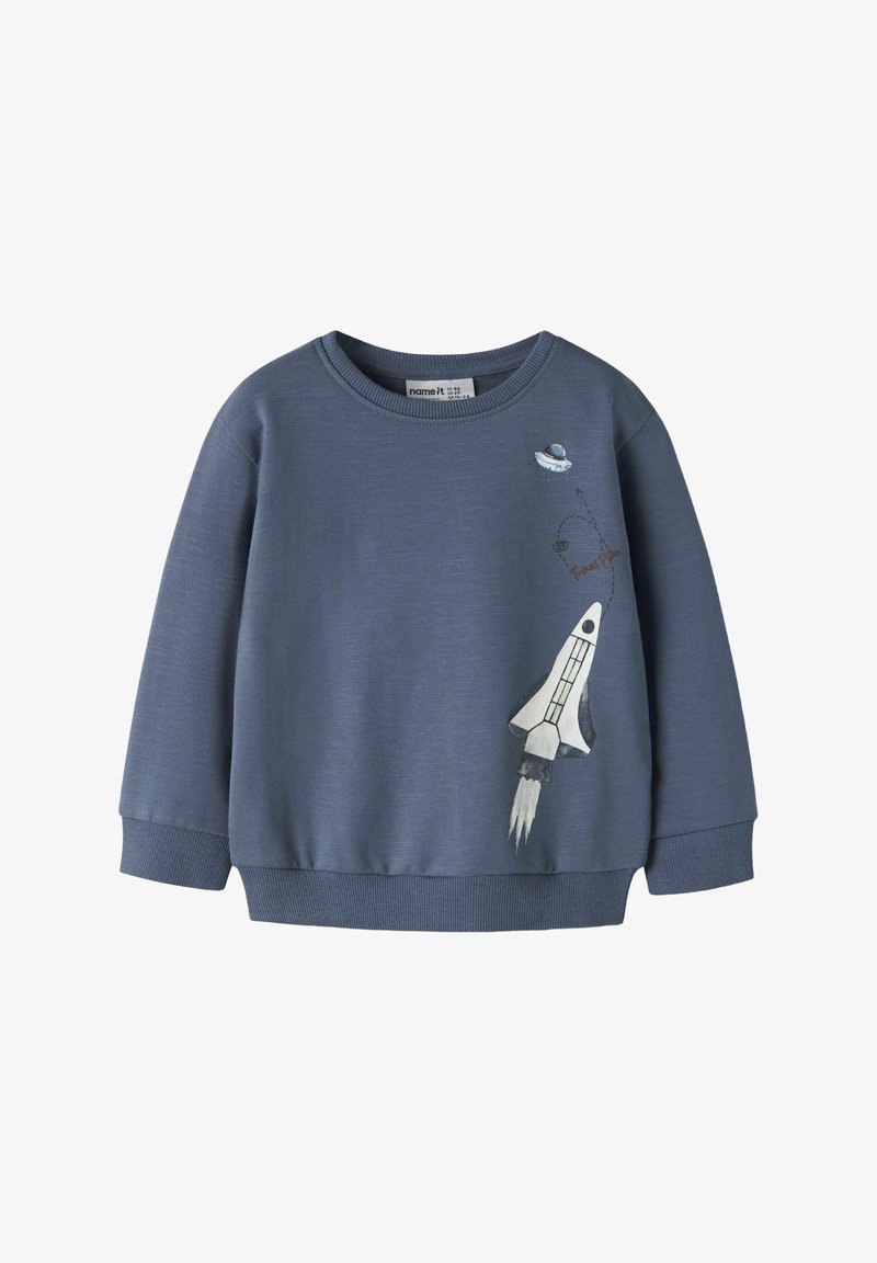 Sweatshirt bleu pour enfants avec un motif de fusée et d'OVNI, accompagné du texte « Vous êtes de » sur le côté droit avant.