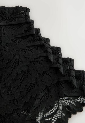 Tessuto in pizzo nero con intricati motivi a foglia, caratterizzato da bordi smerlati e bande elastiche. Testurizzato con intrecci aperti e sezioni lisce.