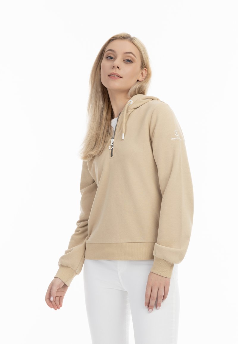 Beige hoodie met een ritskraag, geribde manchetten en zoom. Verfraaid met een klein logo op de mouw. Zachte stoffen textuur.