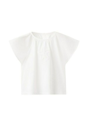 Blouse blanche à manches courtes avec manches larges et délicate broderie florale sur le devant, dotée d'un col rond et d'une coupe ample.