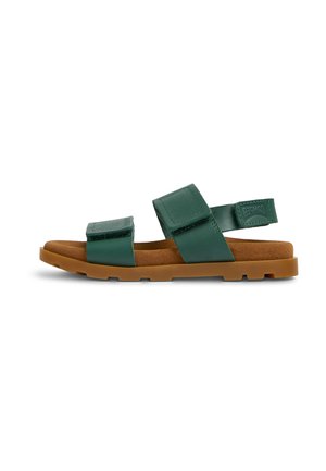 Grøn lædersandal med to justerbare Velcro-stropper og en brun polstret sål på en hvid baggrund.