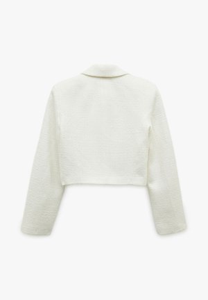 Gekürzte weiße Jacke mit langen Ärmeln, aus strukturiertem Stoff gefertigt. Verfügt über einen klassischen Kragen und klare Linien. Rückansicht gezeigt.